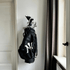 ClubsDock White - ClubsDock Black hanging on the wall in a living room environment